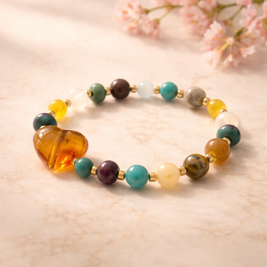 Pulsera de gemas y corazones